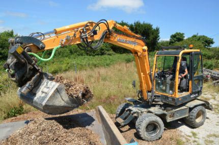 Hyundai 55w9a digger in action